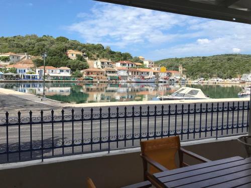 a view of a marina from a balcony at Joanna Seaside House in Meganisi