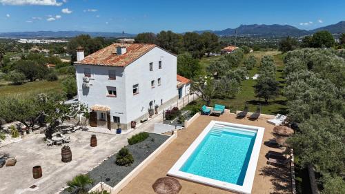 an aerial view of a villa with a swimming pool at B&B Casa Vitalidad in Ontinyent