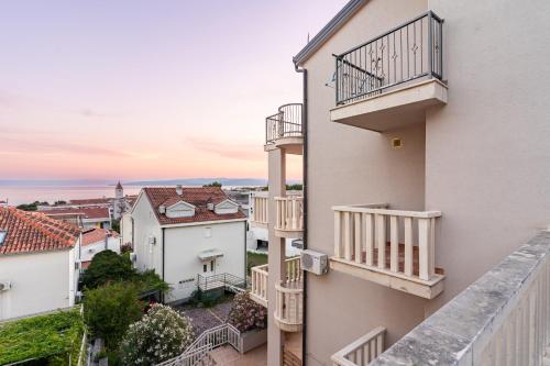 a view from the balcony of a building with balconies at Apartments Amaris in Promajna