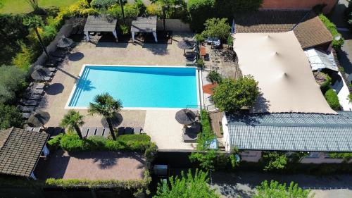 an overhead view of a swimming pool in a house at Hameau du Prat in Ribes