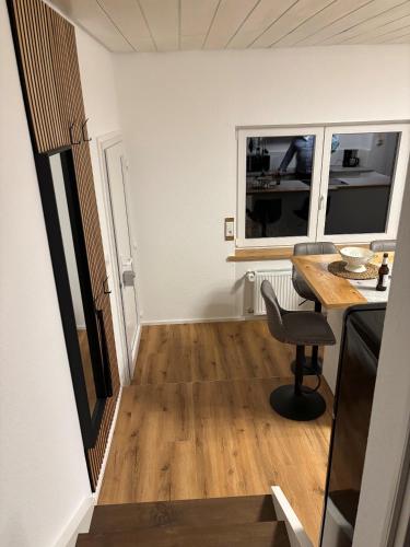 a small room with a table and a window at bei gitta in Olpe