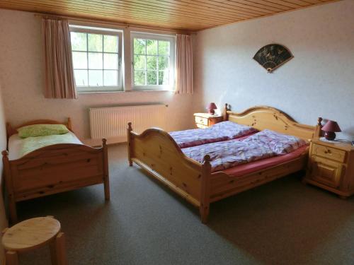 Ferienhof Riensheide Soltau tesisinde bir odada yatak veya yataklar