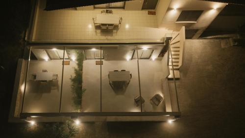 a glass room with a toilet in a building at Casa di Mare in Kyparissia