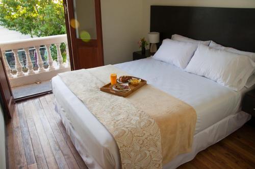 Ліжко або ліжка в номері Dolores Hotel - Uruguay