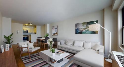 a living room with a couch and a table at rock sidecoast in Quismondo