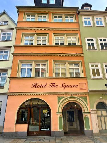 a building with a sign that reads hotel the lyre at The Square Coburg in Coburg