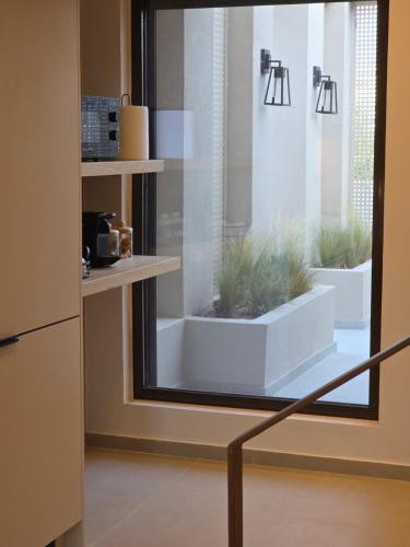 Kostas luxury Sea-View apartments near Airport and Beach
