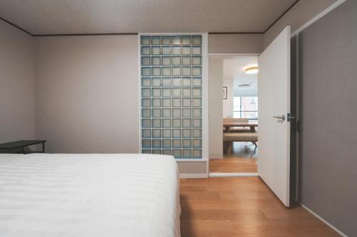 Newly Opened Nishiya Near Namba Nipponbashi and Tsutenkaku 3 Min Walk to Ebisucho Station Spacious Family Apartments 2 Bedroom for Up to 6 Guests and 3 Bedroom for Up to 7 Guests