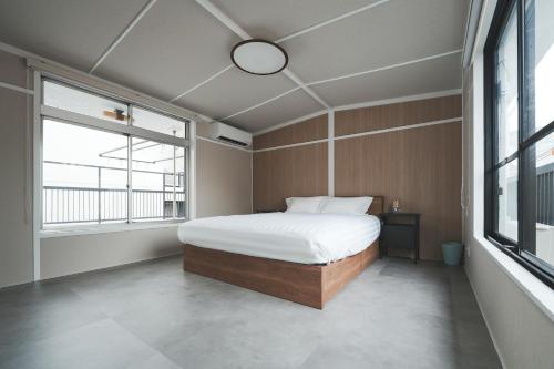 Newly Opened Nishiya Near Namba Nipponbashi and Tsutenkaku 3 Min Walk to Ebisucho Station Spacious Family Apartments 2 Bedroom for Up to 6 Guests and 3 Bedroom for Up to 7 Guests