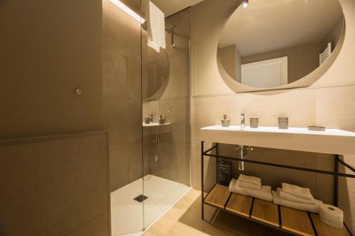 a bathroom with a sink and a mirror at VillaPignone in Genoa