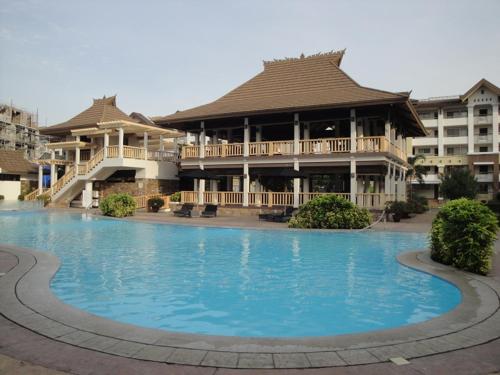 Bazén v ubytování The Oasis Davao Condotel nebo v jeho okolí