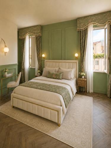 Un pat sau paturi într-o cameră la Hotel Aldobrandini