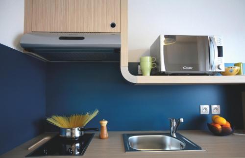 Dapur atau dapur kecil di Résidence Les Portes d'Espagne
