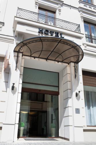 a building with a hilton sign on it at Europa Royale Bucharest in Bucharest