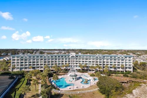 an aerial view of a hotel with a pool at Litchfield Beach & Golf Resort in Pawleys Island