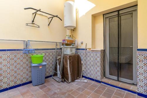 a kitchen with a sink and a shower in a room at Bellavista Los Pinos in Almuñécar