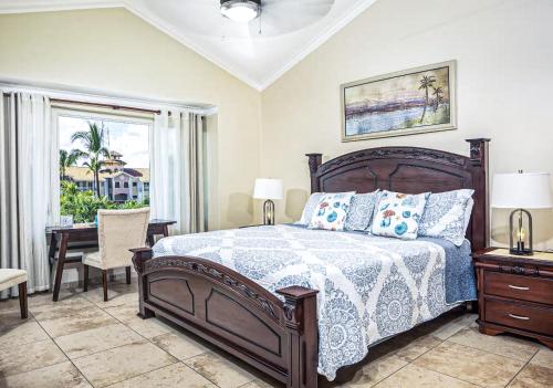 a bedroom with a bed and a desk and a window at Ocean Dream - Kite Paradise! in Cabarete