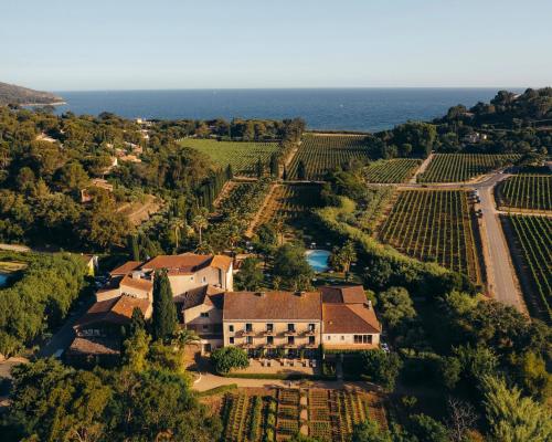 an aerial view of a house and a vineyard at Château de Valmer in La Croix-Valmer