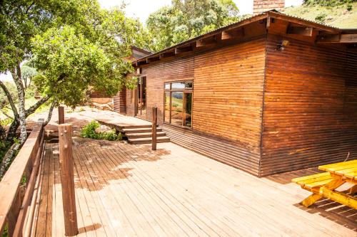 a wooden deck in front of a house at The Stix in Dullstroom