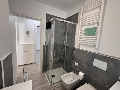 a bathroom with a shower and a sink at golf time apartment - Lido di Venezia in Venice
