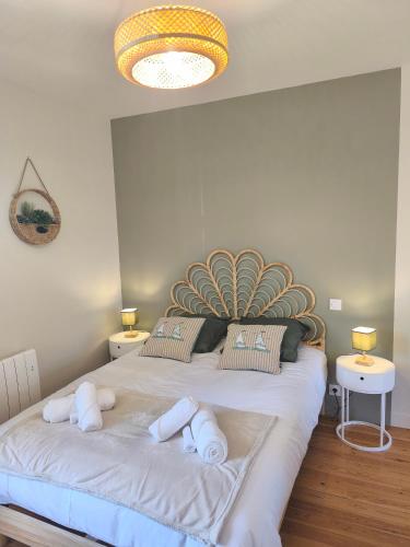 Llit o llits en una habitació de L'échappée Sauge et Sable