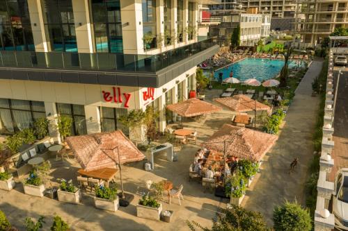 an overhead view of the courtyard of a building with a pool at Green Side Apart Hotel Official in Batumi