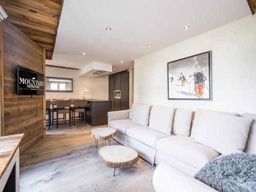 Appartement rénové, ski aux pieds, parking inclus