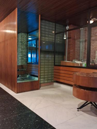 a room with a desk and a chair at Luxury B&B La casa sul mare in Taranto