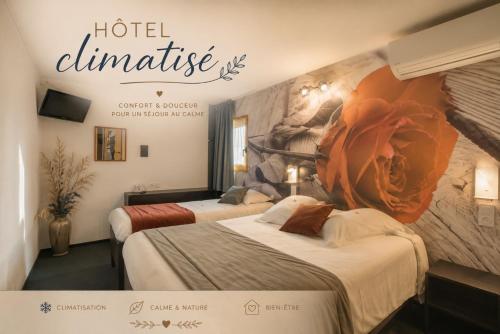 a hotel entrance with two beds in a room at Hôtel The Originals Access, Bourges Nord Saint-Doulchard in Bourges