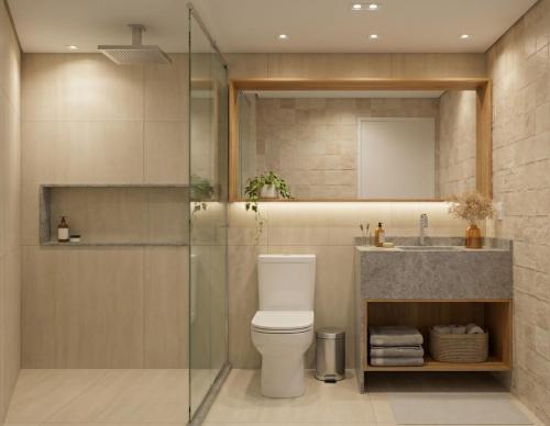 a bathroom with a shower and a toilet and a sink at Porto Beach Resort - Marulhos in Porto De Galinhas