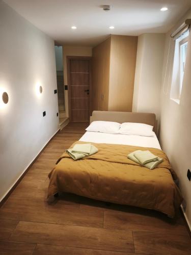 a bedroom with a large bed in a room at Agapi's Nest in Agápi
