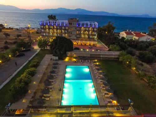 an overhead view of a hotel with a swimming pool at Black & White Resort in Xylokastro