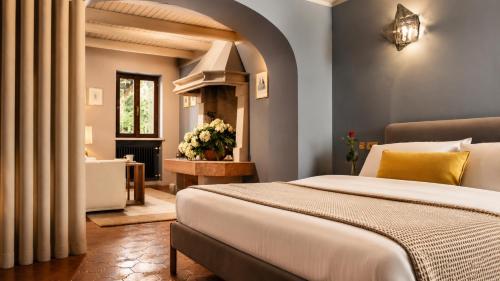 a bedroom with a large bed in a room at Dolomitiloungebelluno Mountain Stay in Belluno