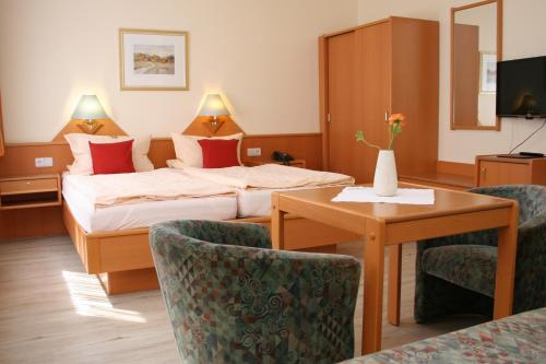 Cama o camas de una habitación en Hotel Petersen