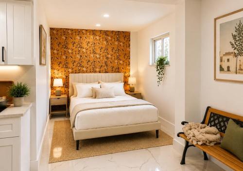 a bedroom with a white bed and a wall at 05 Modern Co-Living Home with Newly Renovated Private Rooms Available in Miami