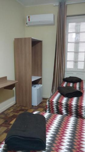 Katil atau katil-katil dalam bilik di Lotus Hotel & Hostel