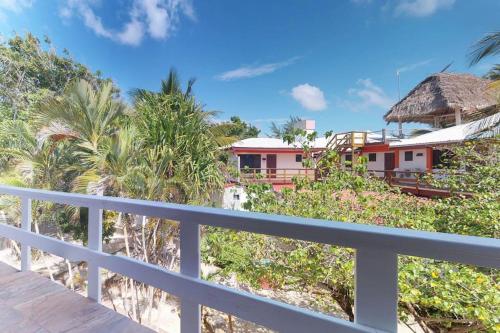 a view from the balcony of a house at Condo #22 @ Beachside Villas in Seine Bight Village