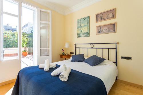 Postel nebo postele na pokoji v ubytování Apartment Link BCN City Center
