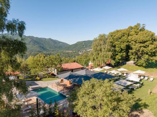 an aerial view of a resort with a swimming pool at Agriturismo La Nevera in Lanzo dʼIntelvi