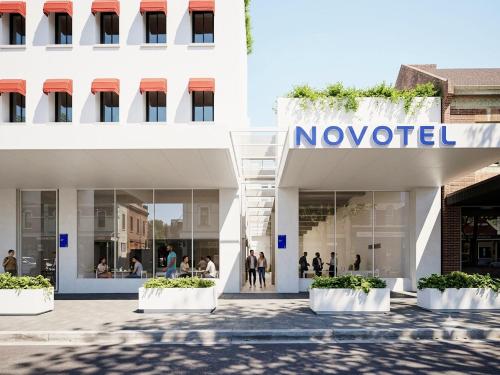 a novisor sign on the front of a building at Novotel St Kilda in Melbourne