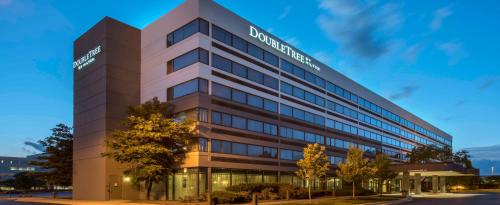 a rendering of the front of a building at DoubleTree by Hilton Chicago Schaumburg in Schaumburg