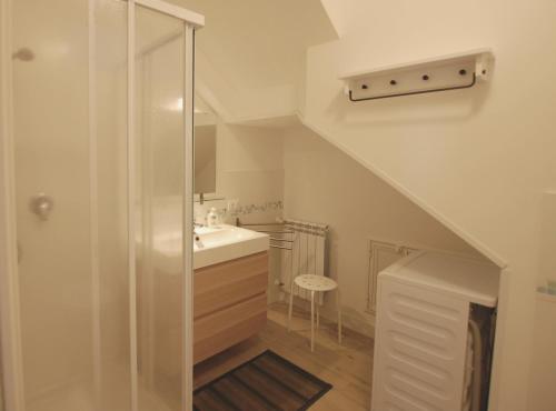 a bathroom with a glass shower and a sink at Casa Vacanza "Donna Franca" in Castellammare del Golfo