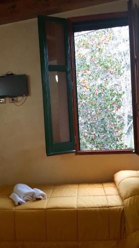 Krevet ili kreveti u jedinici u okviru objekta Country House Villa delle Rose Agriturismo