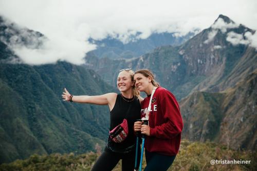 two women standing on top of a mountain at Colpapampa Lodge in Colcapampa