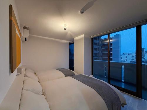 b hotel Lafort honkawa - New 2BR Apt 5 min Walk to Peace Park Sleeps 6