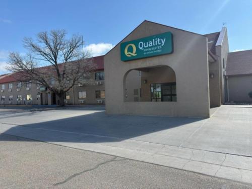 a office building with a sign on the front of it at Quality Inn & Suites Colby in Colby