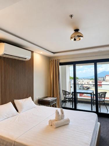 Katil atau katil-katil dalam bilik di The Fields Palace Hotel Premier