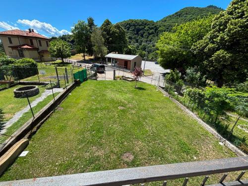 an aerial view of a yard with a house at Diamante - relax nature , WiFi in Arcumeggia