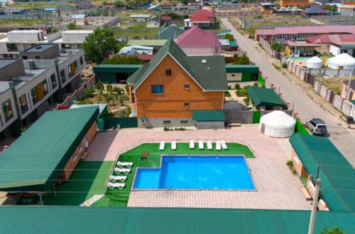 an overhead view of a building with a swimming pool at Зона отдыха Мирас in Kapchagay