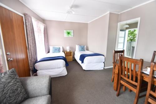 Katil atau katil-katil dalam bilik di Union Victoria Motel